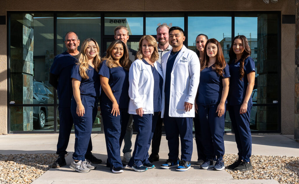 The staff of Body Balance Medical outside of the office.