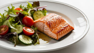 A healthy meal of salmon and salad.